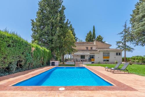 Santa Fe House | Huerto del Carmen