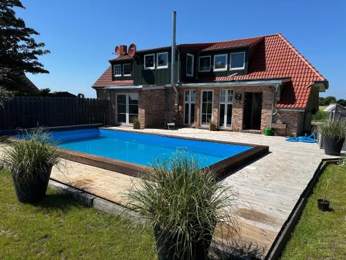 Ostermarsch House | Huus ant Diek, Luxus in Deichnähe, Erdgeschosswohnung mit Pool