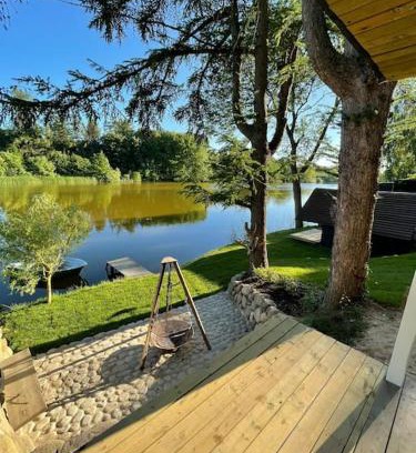 Egedal Kommune House | Hyggelig sommerhus. med udsigt, til vand fra senge