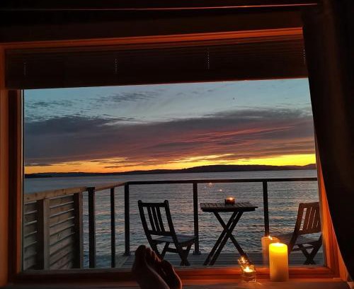 Ostre Toten Other | Idylliske Evjua ved Mjøsa