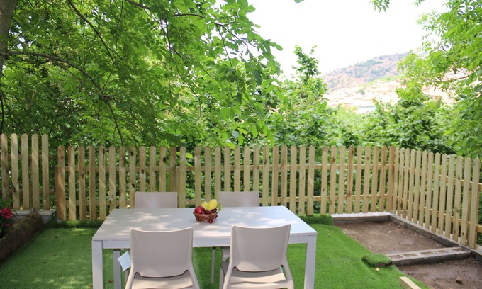 Aritzo Condo | Independent stone apartment in a holiday home with garden and barbeque