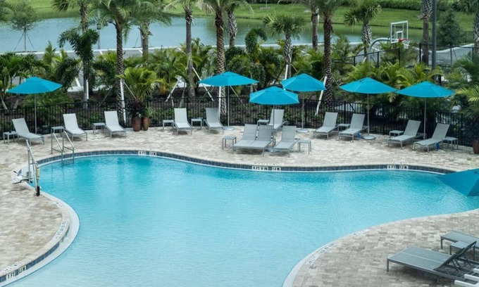 Port Canaveral Hotel | Indulge in Home Like Comfort! Pool, Kitchenette, Free Breakfast, Parking!