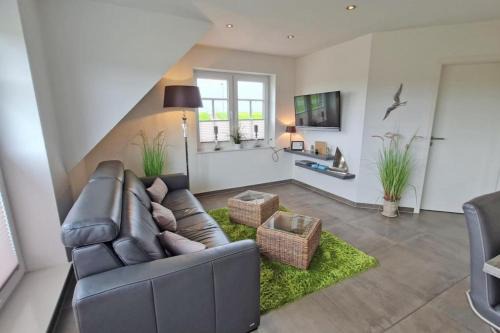 Norddeich Apartment | Inselblick am Kutterhafen - Erholung am Deich und Hafen f?r 2 Personen