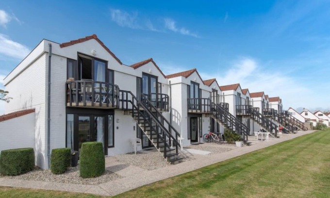 De Haan Apartment | Isabelle with parking and shared pool by Interhome