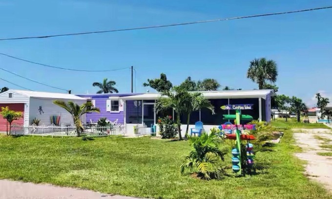 Flamingo Bay House | ISLAND TIME! DOCK! POOL! KAYAKS! BOAT To BEACH! PETS ALLOWED!