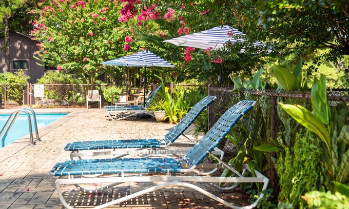 Mount Ida Apartment | JI8, Queen Guest Room at the Joplin Inn at entrance to the resort, , just 2 1/2 miles from Lake Ouachita. by RedAwning