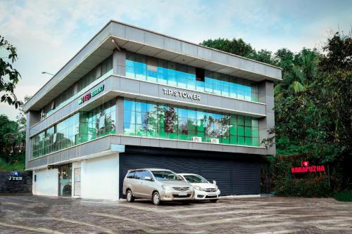 Muttil South Hotel | JTEN Residency