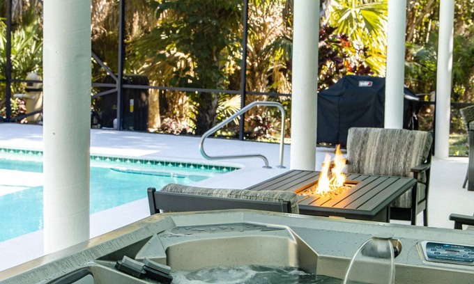 Jupiter Farms House | Jupiter. 2.5 serene and private acres. Surrounded by tropical landscaping.