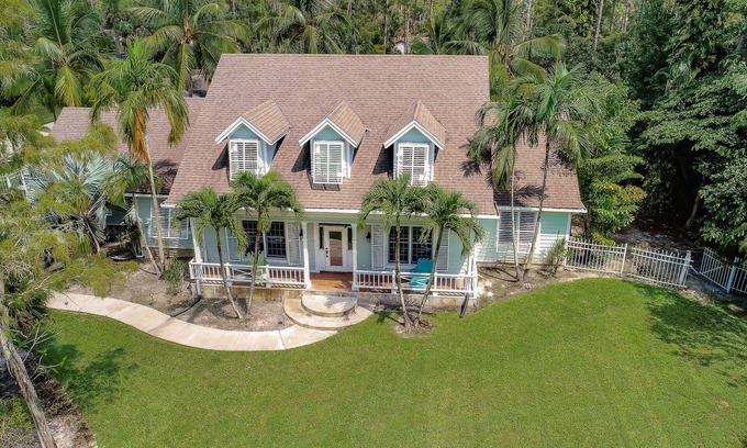 Oakes Estates House | Key West Style Luxury Home with resort style heated pool and infinity line spa