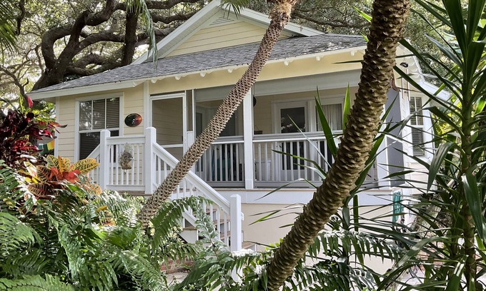 New Smyrna Beach Cottage | Kingfisher Cottage on Canal and two blocks to Ocean, amidst a tropical landscape