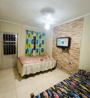 Jardim Virginia House | kitnet family - 2 quadras da praia da Enseada