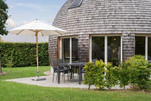 Muritz House | Kugelhaus Kirana - Ruhiges Naturdomizil in runder Bauweise am Waldrand des Tollensesees