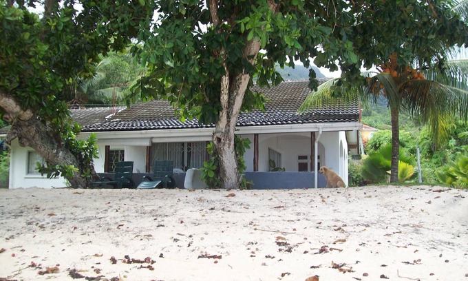 Mahe Island Villa | "L'Escapade Beach Villa" Seychelles, nestled on white sand beach, palms and sea