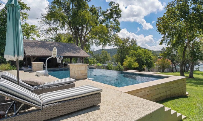 Leander House | Lake Travis Tranquility: waterfront w/pool, hot tub, boat dock, bar & game room