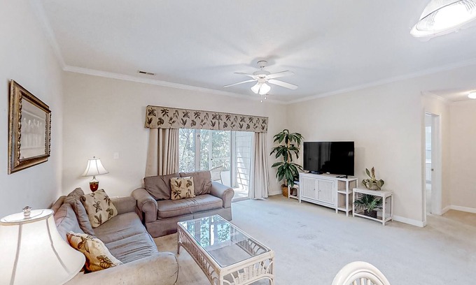 Little River Condo | Lake-view ground-floor condo with screened patio, W/D, & pool