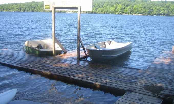 Frontenac House | Lakefront Cottage: Hot Tub, Dock, & Amenities: Boats, Kayaks, SUP, Bikes, Bball