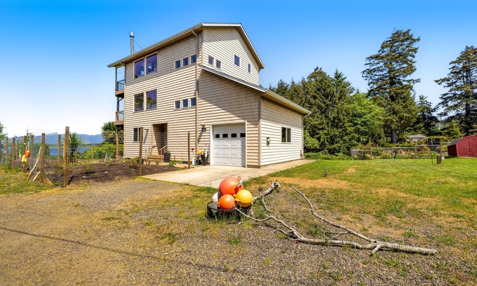 Cape Meares House | Lakefront escape with water views, grill, wrap-around deck - walk to beach