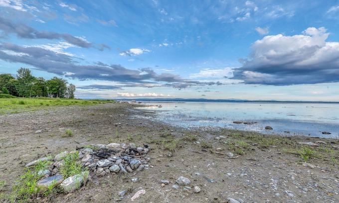 North Hero House | Lakefront home with 17 acres - amazing water views, sauna, inviting deck