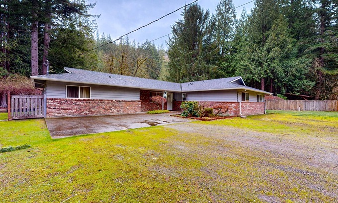 Snoqualmie House | Lakefront home with private dock, lake views, firepit, & wood stove