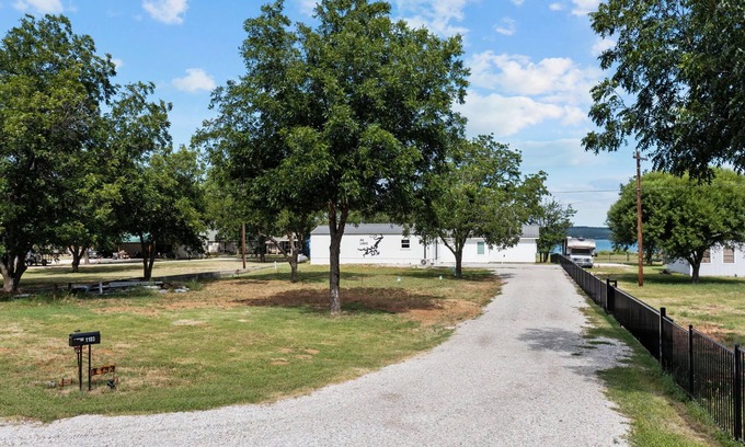Graford House | Lakefront Retreat with Sandy Beach!