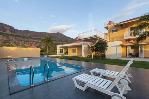 Khodala Villa | Lakeside Summers by StayVista - Mountain and Waterfalls view, Terrace, Pool & Snooker table for a perfect getaway