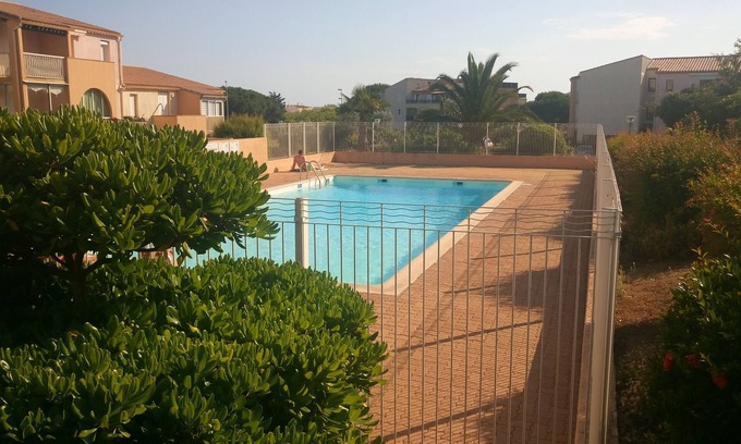 Cap d'Agde Apartment | Lara 2 - T2 Balcony Swimming pool Double bed & sofa bed Private parking