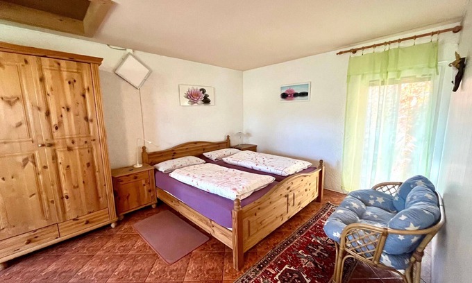 Oberhavel House | Large guest room with terrace