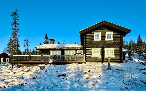 Ringsaker House | Large log cabin at Sjusjøen with sauna, fireplace and panoramic view