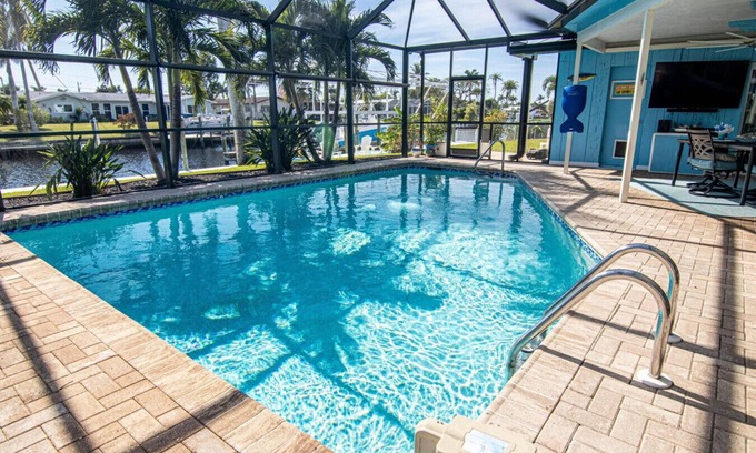 Lochmoor Waterway Estates House | "Latitude Adjustment" with Heated Pool and Boat Dock