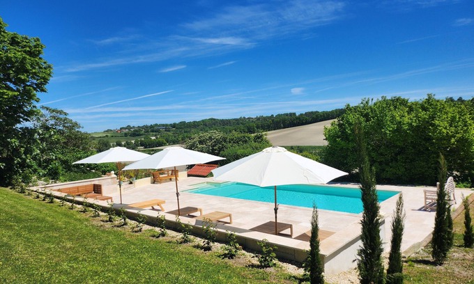 Celles Cottage | Le Grenier, a charming gîte on the side of a hill. Stunning views, stunning pool
