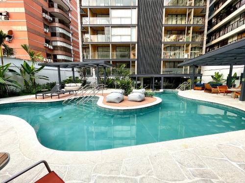 Leblon Apartment | Leblon Studio - View of the Christ, pool and gym.