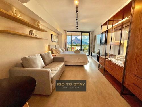 Leblon Apartment | Leblon Studio - View of the Christ, pool and gym.