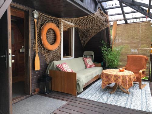 Blanki Cabin | Letnisko SYMSAR 6, Drewniany domek letniskowy z ogrodem