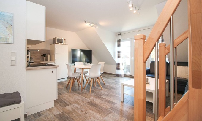 Norden Apartment | Lichtdurchflutete Obergeschosswohnung für 4 Personen + Baby und Hund