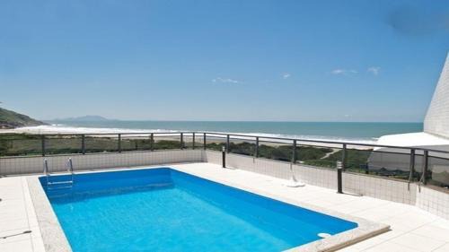 Ingleses Norte Apartment | Linda cobertura frente mar com piscina privativa e pé na areia!