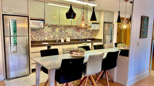 Carniel Apartment | Lindo e aconchegante com lareira cond c/piscina