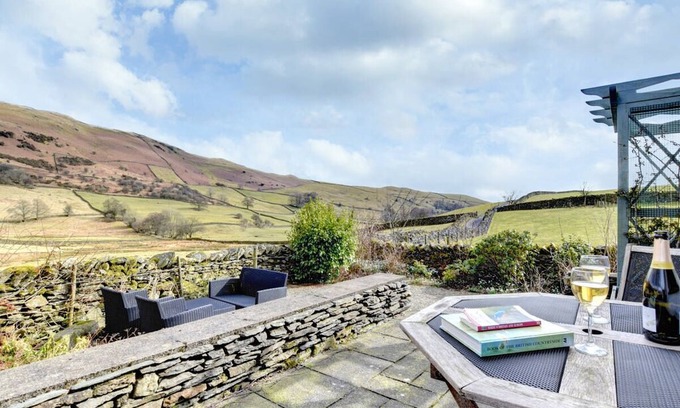 Kendal House | Littlewood cottage is in the village of Staveley. With fell views and walks straight from the door,