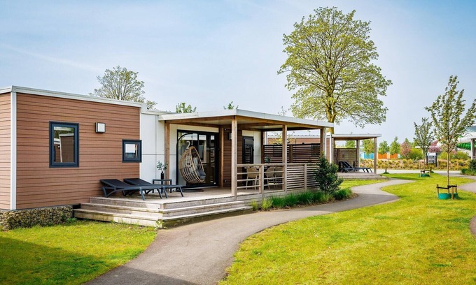 Maurik Ski Chalet | Lodge in Netherlands with Pool & Veranda