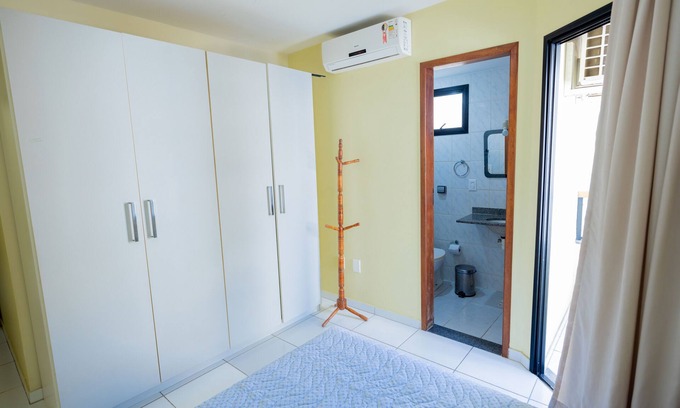 Praia do Morro Apartment | LONDRES 201 BUILDING, 2 bedroom apartment, 1 garage, air conditioning in the suite, 200m from MORRO BEACH.