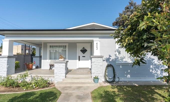 Bluff Heights House | Long Beach Craftsman House. Historic district house-centrally located