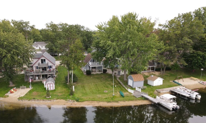 West Branch Cottage | Loon Lookout has its own beach and is on a private lake in West Branch, MI