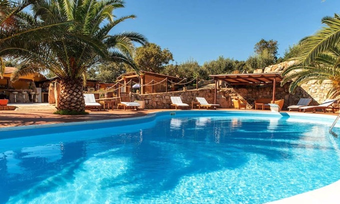 Telti Apartment | Lovely apartment for 4 people with pool, A/C, WIFI, TV, patio, pets allowed and parking