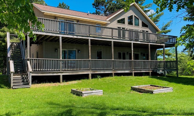 Tomahawk House | Lower unit with 400 ft of frontage and close to town