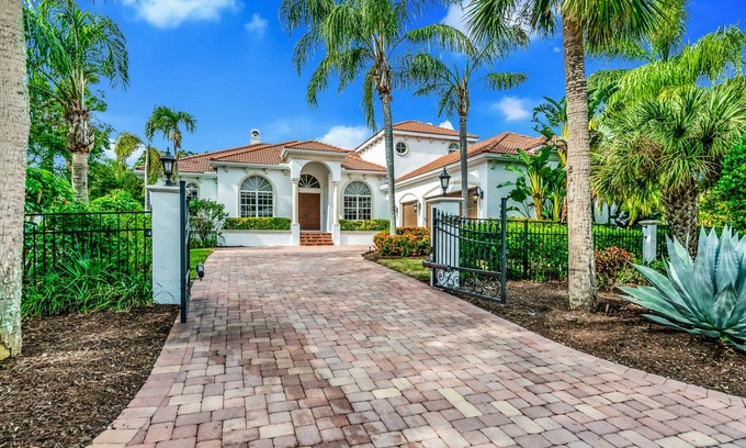 Bay Isle House | Luxurious Paradise with Tiki Bar and Heated Pool, Just Remodeled!
