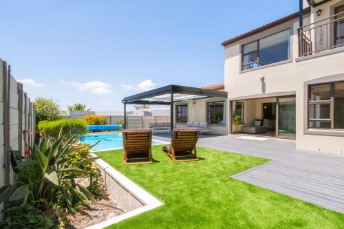 West Beach House | Luxury 5 Bedroom Villa with Heated Pool and Inverter in Blouberg