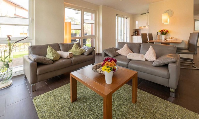 Ostseebad Baabe Apartment | Luxury apartment with sauna, corner bath, fireplace, wireless, beach chair on patio