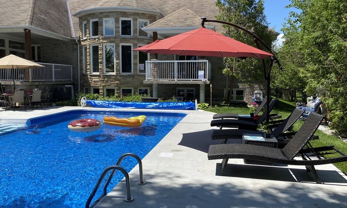 Carden House | Luxury Lake Home with Hot Tub and Pool