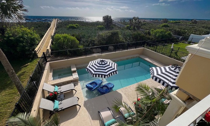 Palm Coast House | Luxury Oceanfront Oasis: 4BR Cinnamon Beach Bliss with Pool & Balconies