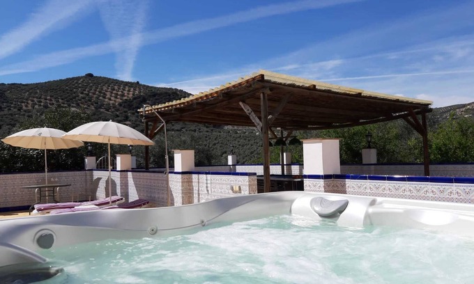 Iznajar Apartment | Luxury Poolside Apartment 1 over looking the Chlorine free Pool and Hot Tub