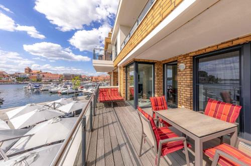 Muritz Apartment | Müritzoase - Apartment mit Infrarot-Kabine & Müritzblick in der Hafenresidenz